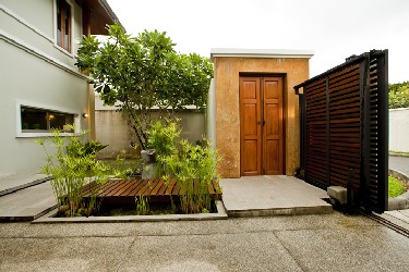 Front Garden with Fishpond, Welcome Gate and Carport